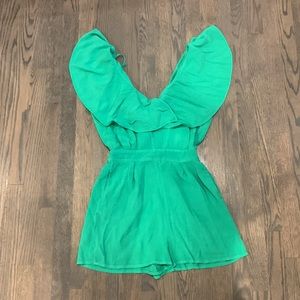 This is a Green romper. Size XS. From Zara